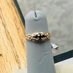 288983 10k black hills gold with a blue sapphire